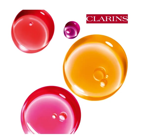 Clarins زيت العناية بالشفاه